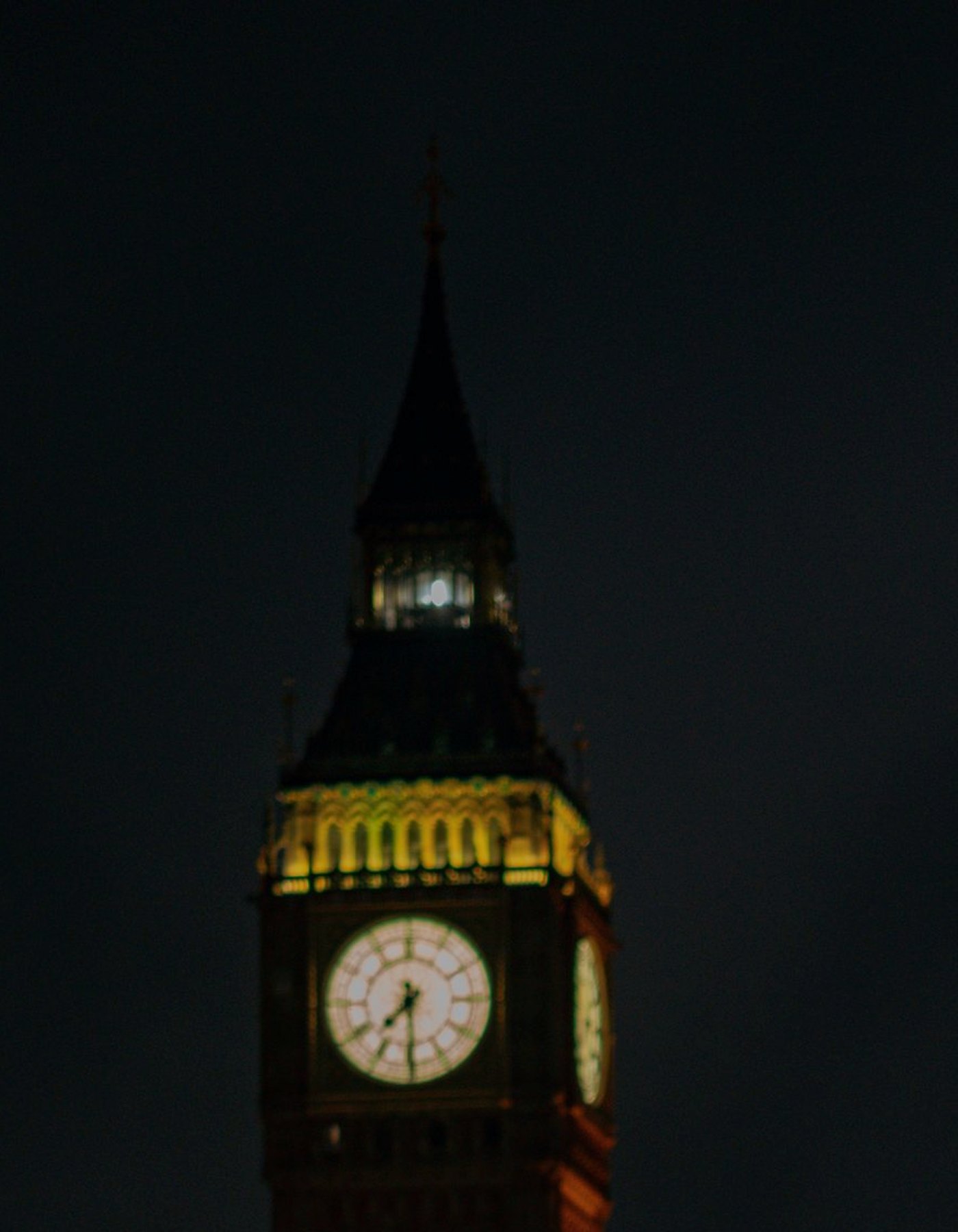 Big Ben at night with no road traffic visible
